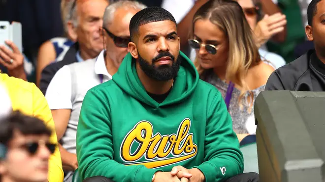 Drake attends Wimbledon.