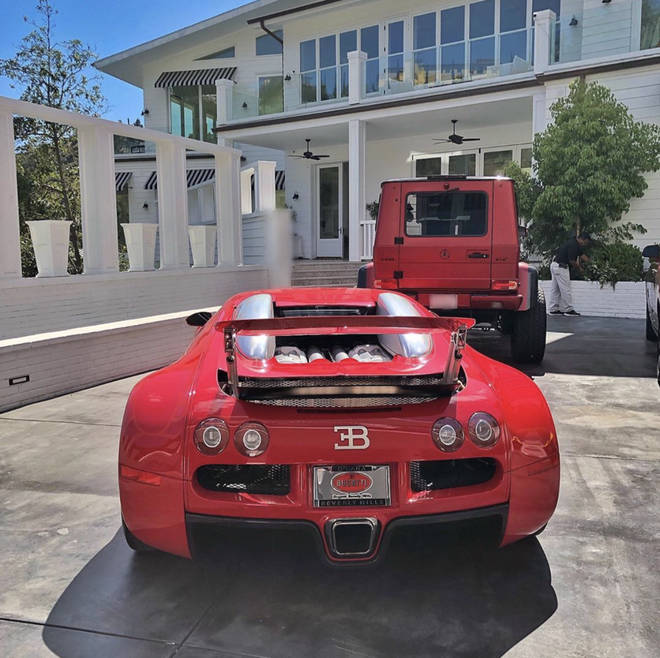 The vast exterior of Tyga's three-storey mansion and its guesthouse is also home to the rapper's collection of luxury sportscars.