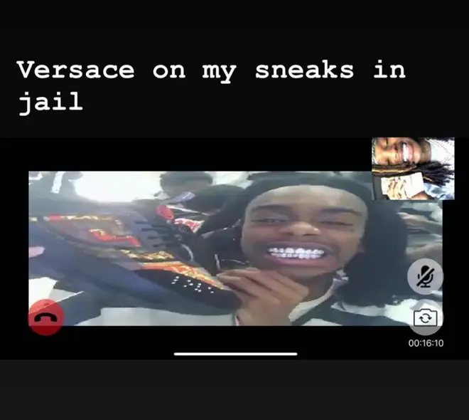 YNW Melly shows off Versace sneakers in jail