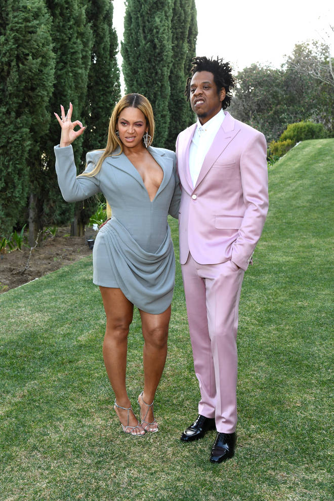 Beyonce and Jay Z were among many attendees who stayed seated during the national anthem at the Super Bowl. (Pictured here at the Roc Nation Brunch in January 2019.)