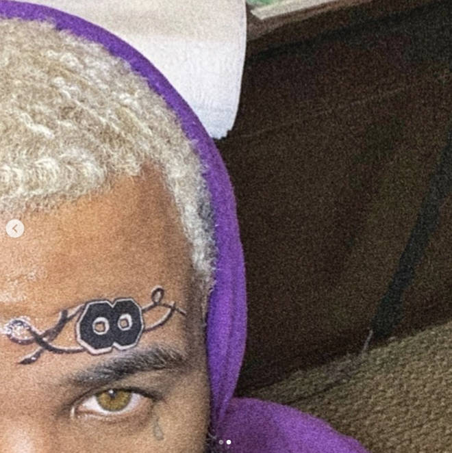 The Game shows off his infinity number 8 Kobe Bryant tattoo