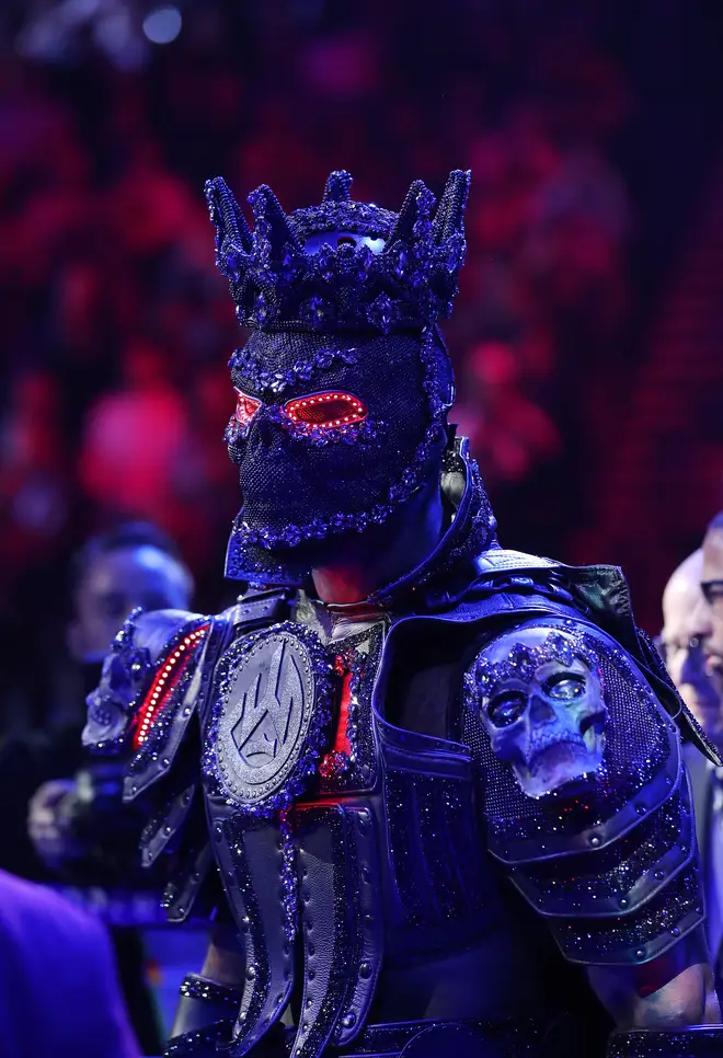 Deontay Wilder says his 40-pound costume wore down legs before his fight against Tyson.