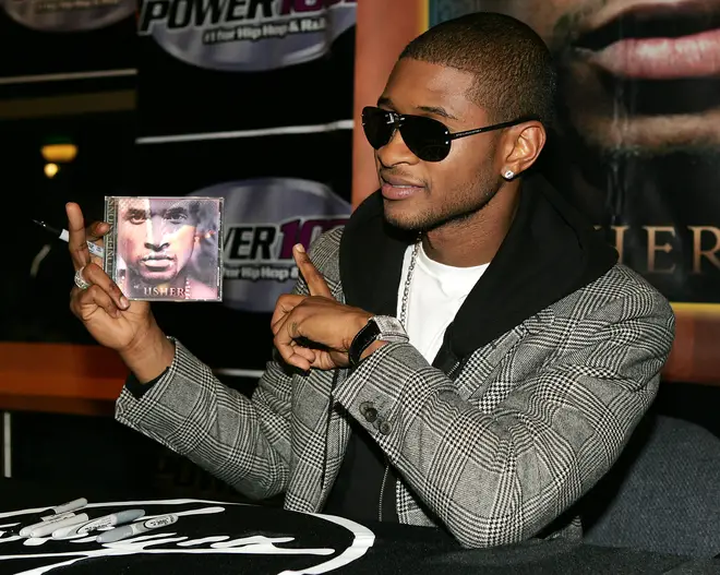 Usher Signs Copies Of His CD At Virgin Records in 2004