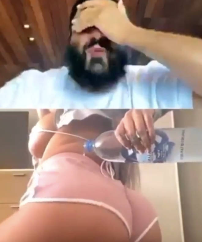 DJ Khaled covers his eyes while a female fan attempts to twerk for him on IG Live