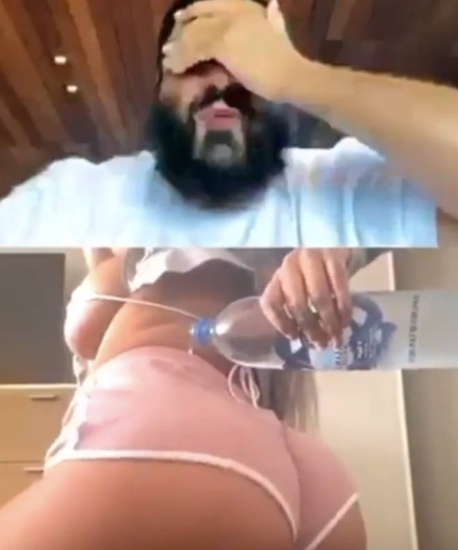 DJ Khaled covers his eyes while a female fan attempts to twerk for him on I...