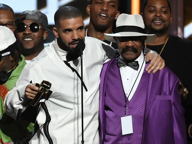 Drake's father Dennis Graham celebrates his Billboard Music Award win in 2017