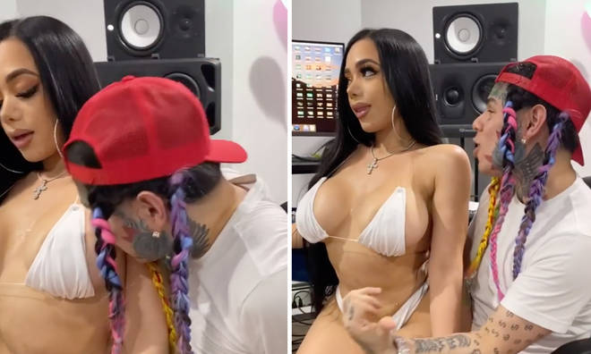 Tekashi 6ix9ine was spotted getting up close and personal with an unknown woman in his new video.