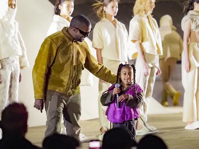 North West makes her rap debut during Kanye&squot;s "Yeezy Season 8" show at Paris Fashion Week