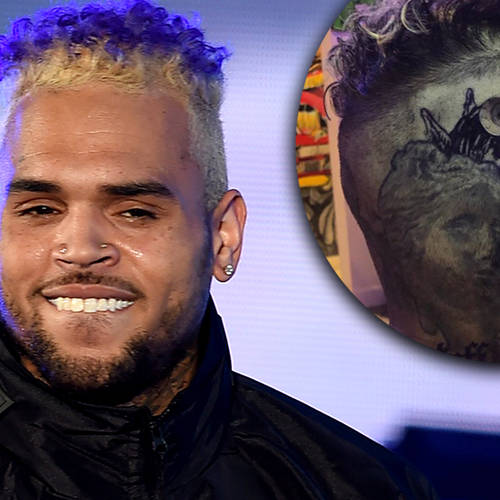 Chris Brown shocks fans with his huge dog tattoo on his skull