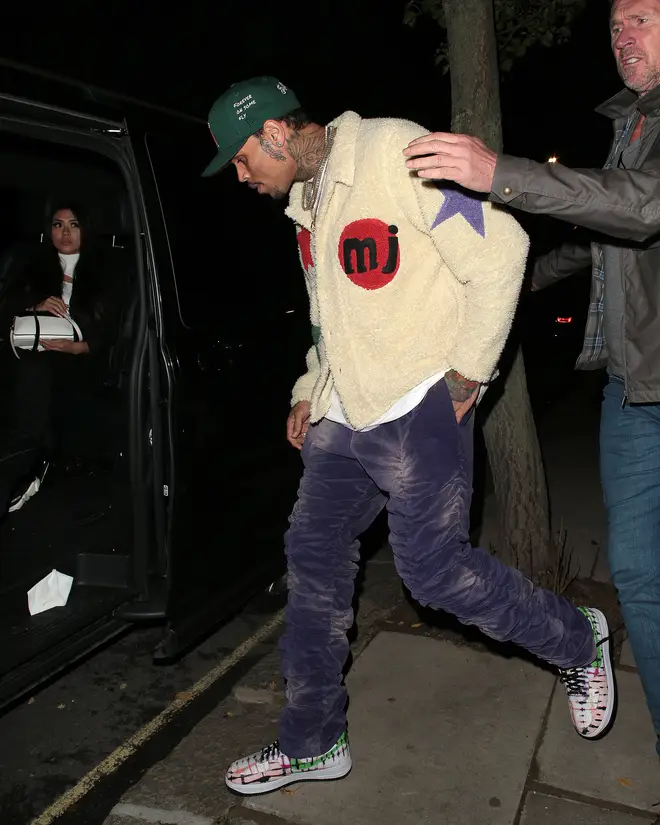Chris Brown was seen getting into the vehicle with his girlfriend Gina
