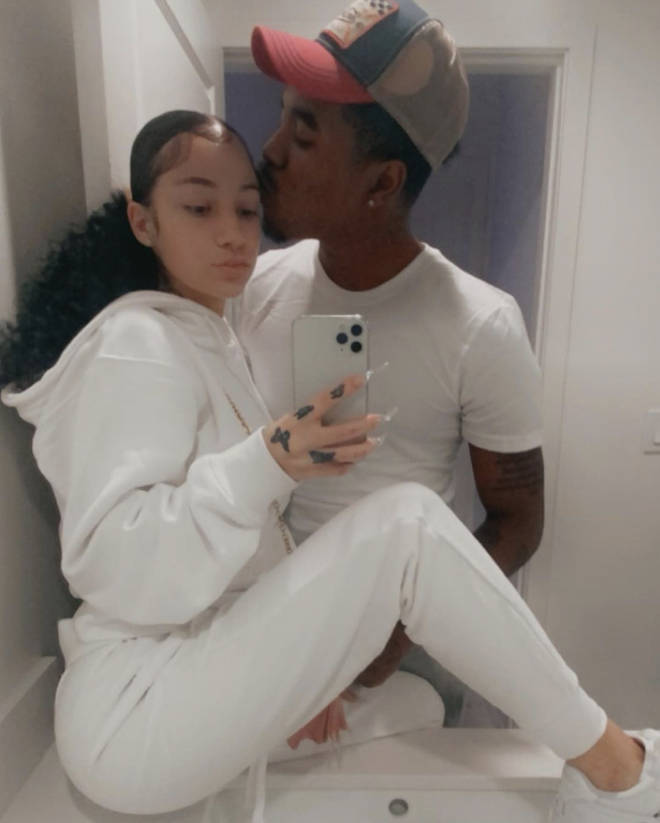 Bhad Bhabie's new boyfriend plants a kiss on her forehead in new photos on social media.