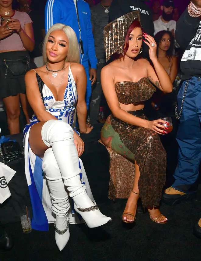Saweetie and Cardi B spotted sitting next to each other at the Huncho Reality "The Album Release Experience in 2019