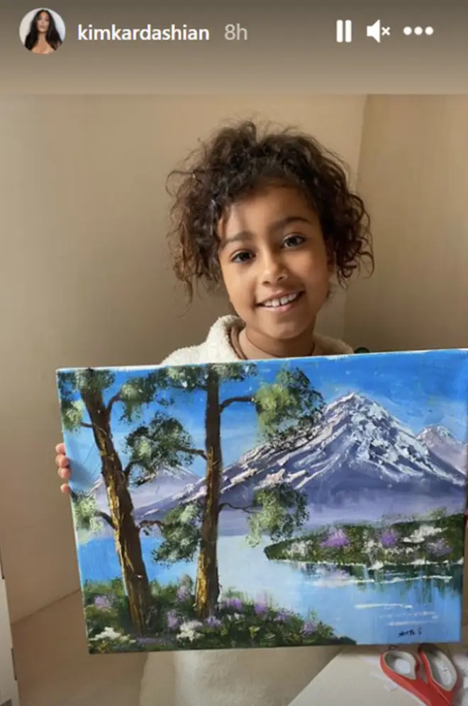 Kim Kardashian shares a photo of North West holding her oil painting