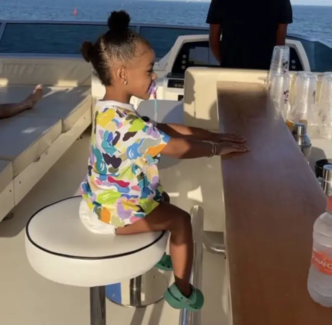 Kulture enjoying the boat trip with her parents celebrate Valentine's Day