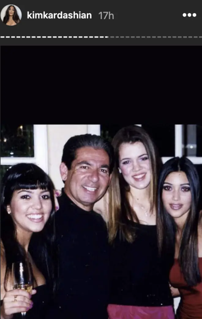 Kim Kardashian shares a photo of her late father Robert Kardashian and her sisters, Kourtney and Khloe.