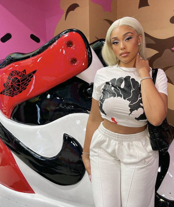 Jordyn shares another photo of herself sporting her Nike tracksuit bottoms, a graphic t-shirt and her diamond ring.