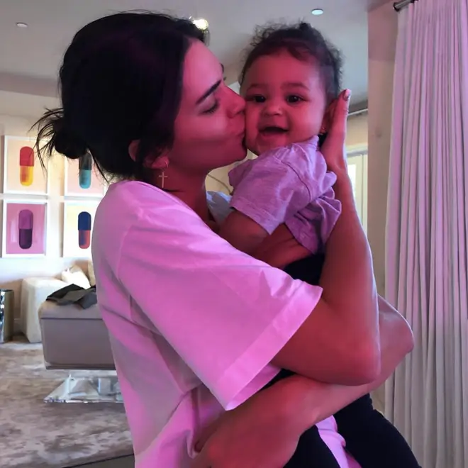 Kendall Jenner (pictured here with niece Stormi) revealed she's got baby fever in the latest episode of Keeping Up With The Kardashians.