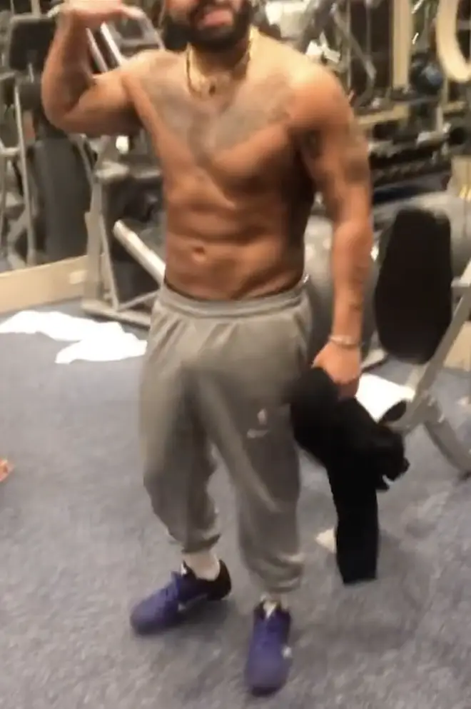 Drake shows off his physique in shirtless video.