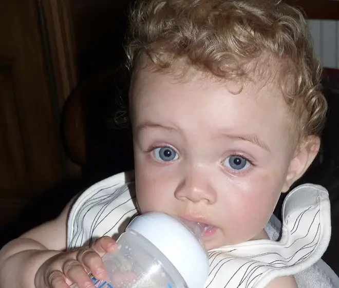 Adonis as a baby, drinking his bottle.