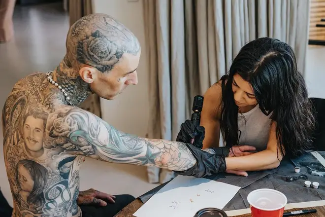 "I tattoo," Kourtney wrote on Instagram alongside snaps of her tattooing Barker.