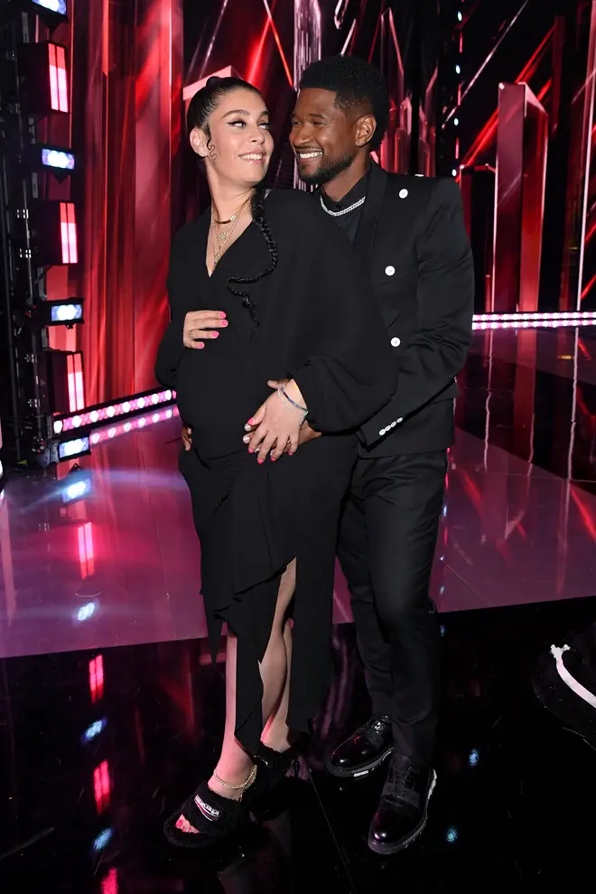 Jenn Goicoechea and Usher reveal they're expecting baby no.2 at the 2021 iHeartRadio Music Awards.