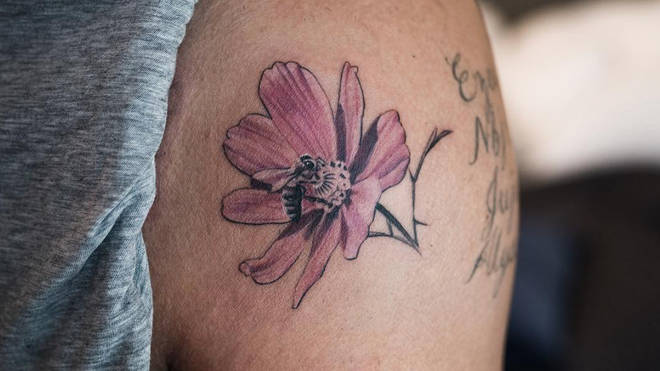'More Life' flower tattoo