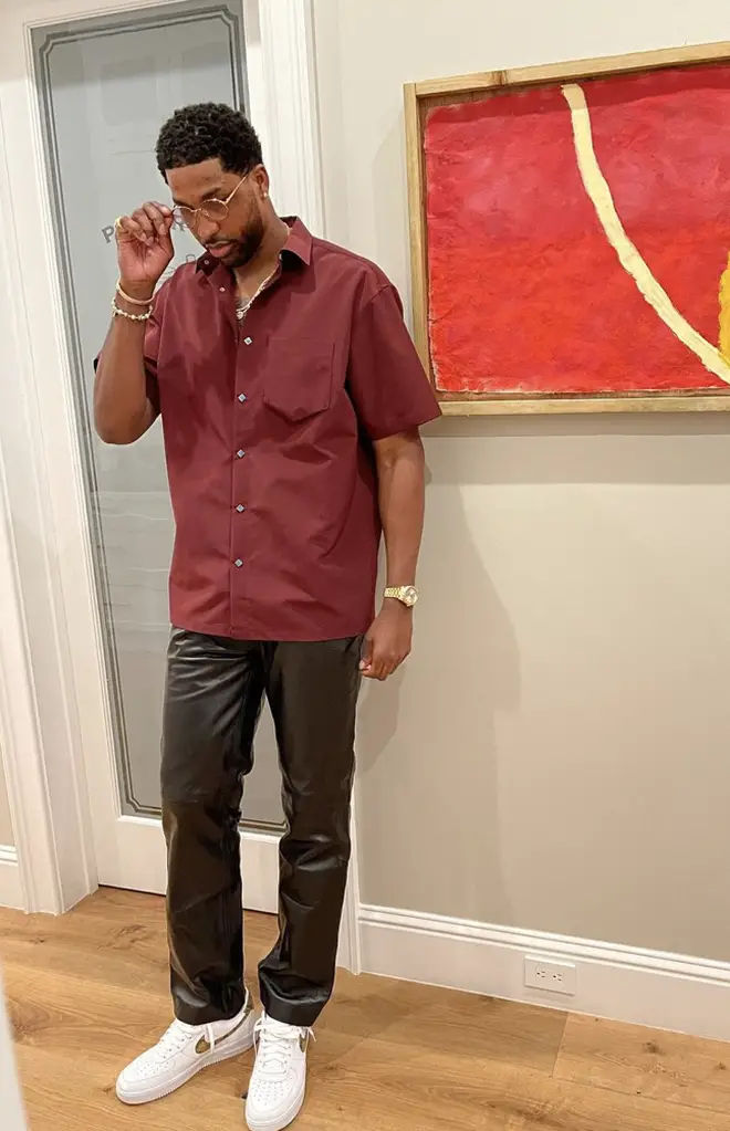 Tristan Thompson wears shirt and leather trousers to Bel-Air house party.