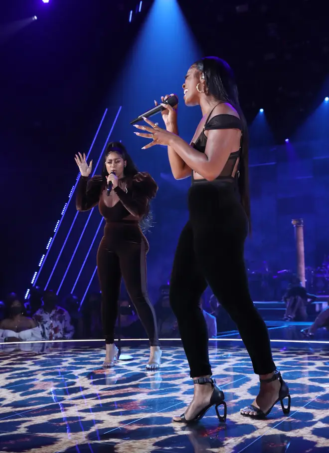 Jazmine Sullivan and Ari Lennox perform onstage at the BET Awards 2021 at Microsoft Theater on June 27, 2021 in Los Angeles, California.