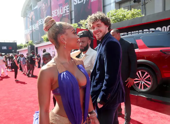 Saweetie and Jack Harlow interact on the red carpet at the BET Awards 2021.