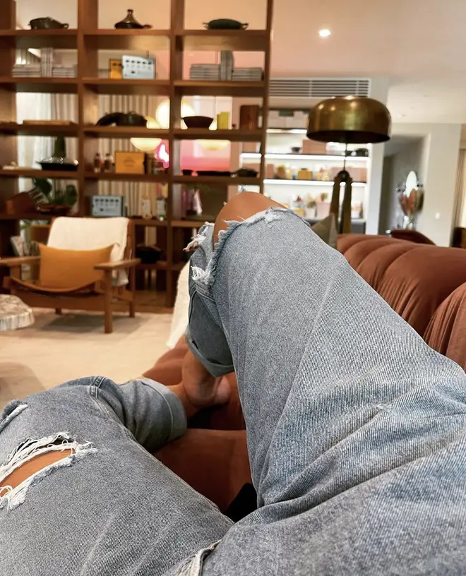 Chrissy Teigen shares a snap of her on her sofa while explaining how she feels following the bullying scandal.
