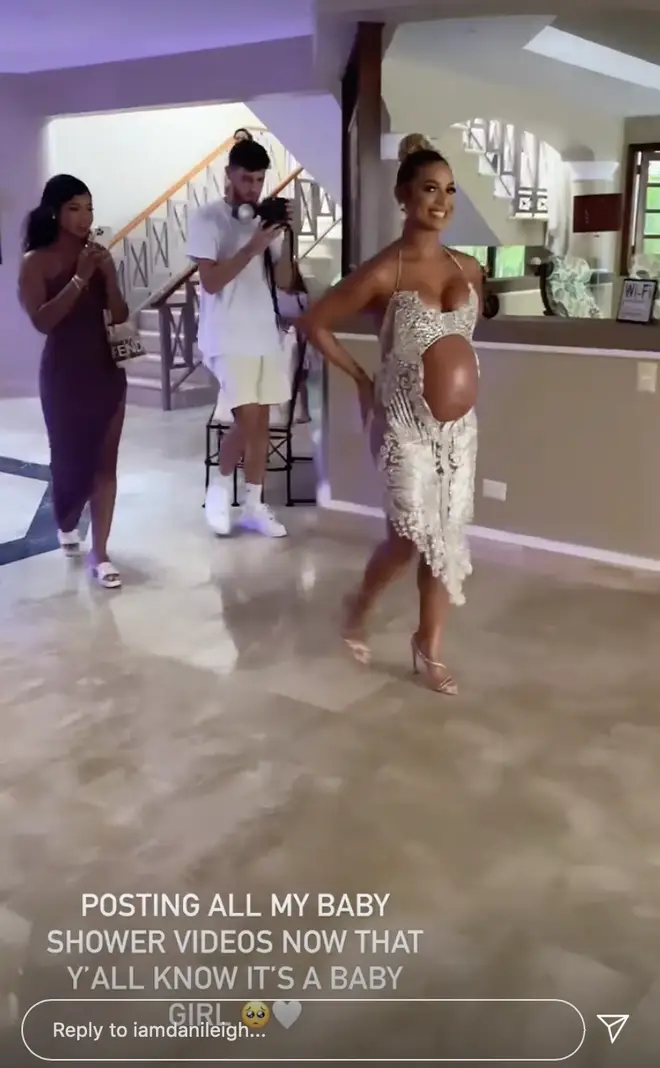 DanLeigh shows off her pregnant baby bump in stunning dress at her baby shower.