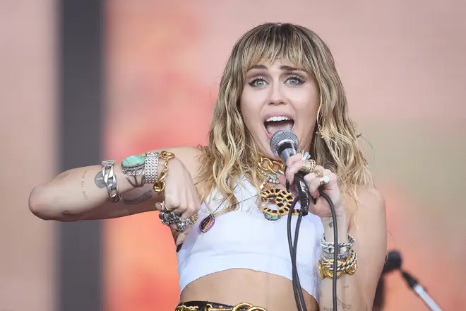 Miley Cyrus says she is 'dedicated to encouraging love, acceptance, and open mindedness' during her post about DaBaby's homophobic comments,
