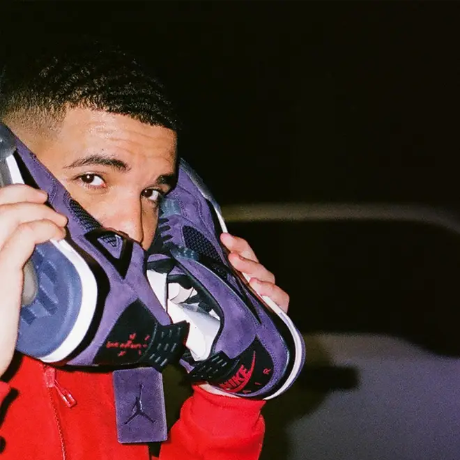 Drake Holding Trainers To His Ear