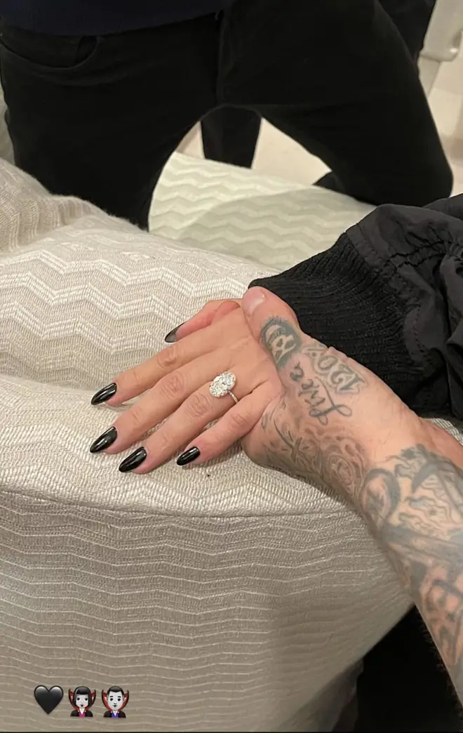 Travis' step-daughter Atiana De La Hoya shared a photo of Kourtney's glistening engagement ring.