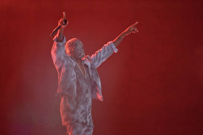 Kanye West wears a mask while performing  on stage at Wireless Festival, London, in 2014.