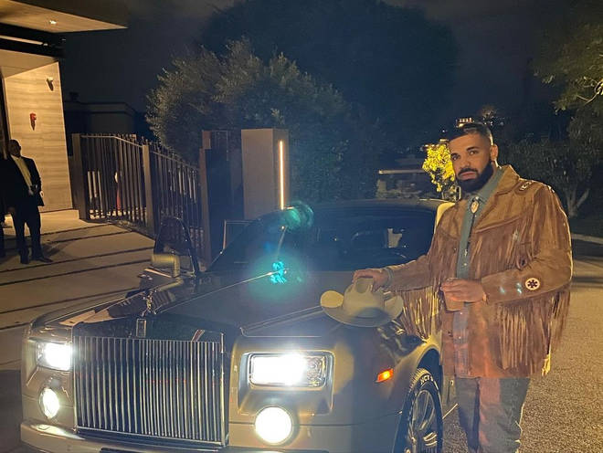 Drake dresses up in his cowboy attire for his 35th birthday party.