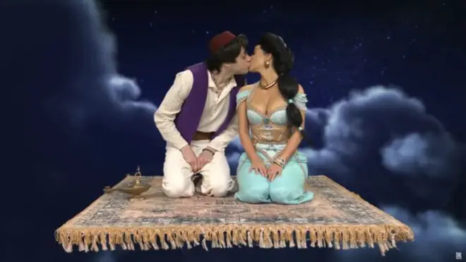 Pete Davidson and Kim Kardashian shared a kiss during a sketch for her Saturday Night Live debut.