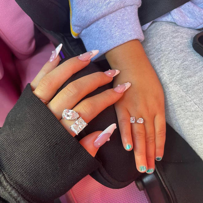 Kylie Jenner shared a photo of her matching rings with daughter Stormi – which was gifted to them both by Travis Scott.