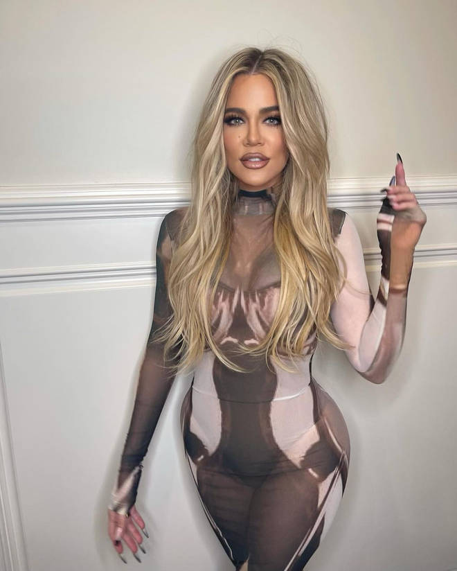 The reality TV star shared a photo of herself posing in her sheer jumpsuit, leading many fans to label her "tone deaf".