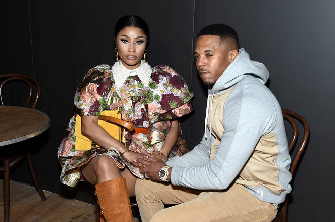 Nicki Minaj and Kenneth Petty stand accused of 'harassing' a woman who claims she's a victim of Petty's sexual assault.