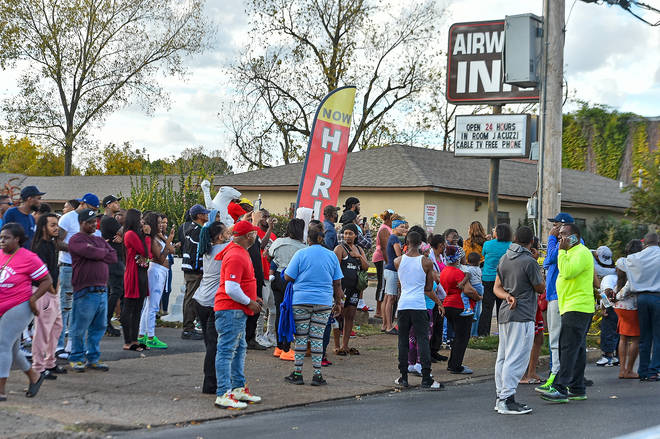Fans gather outside of Makeda's Cookies bakery after Young Dolph was shot and killed on November 17, 2021.