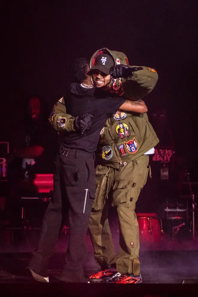 Chris Brown (R) joins Wizkid on stage at his sold out London O2 Arena show.