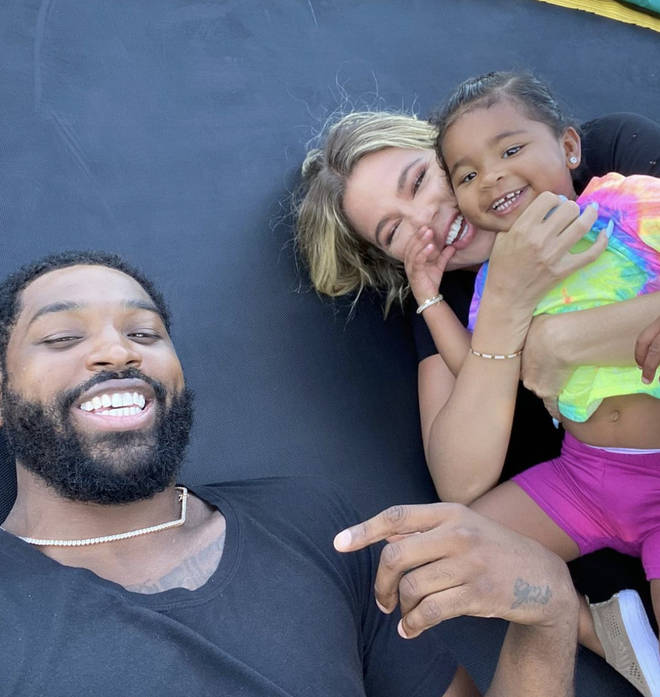 Tristan Thompson, Khloe Kardashian and their daughter True pictured together in June 2020.