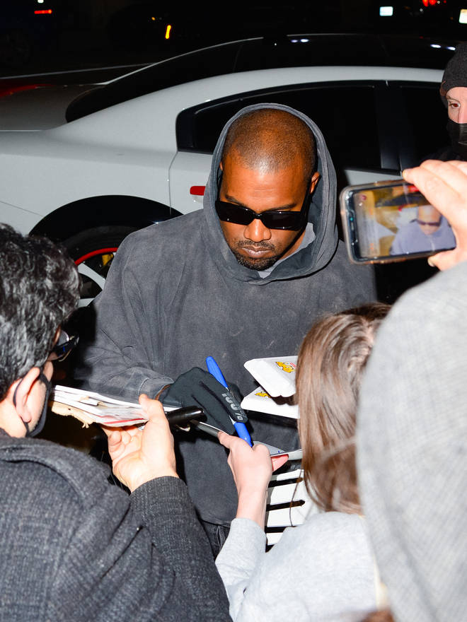 A video shows Kanye West raging after allegedly punching a fan who asked for an autoograph.