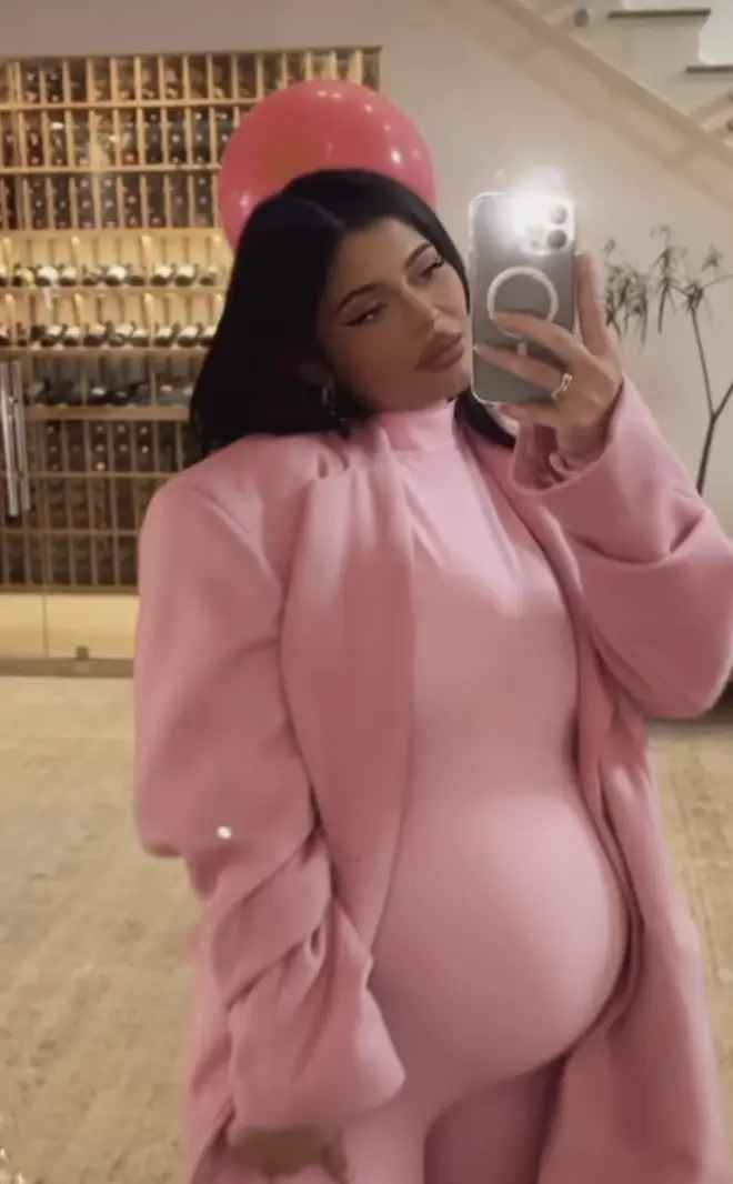 Kylie Jenner dispels rumours she's given birth by flaunting her baby bump