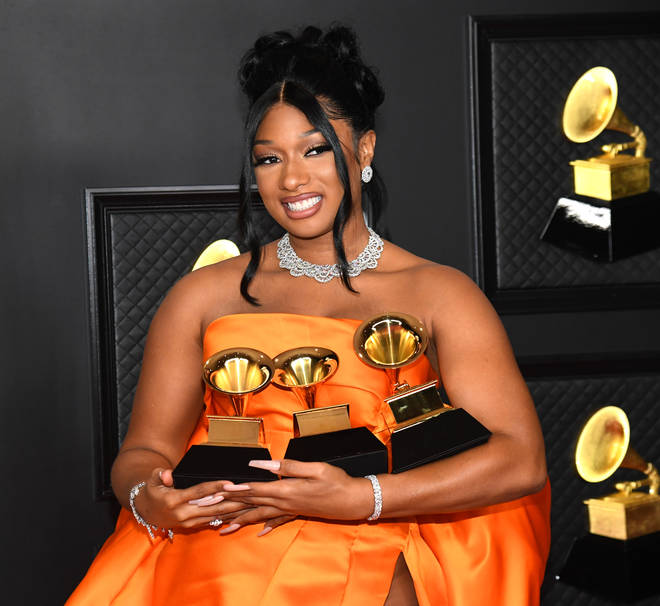 Megan Thee Stallion with her awards at the 63rd Annual GRAMMY Awards
