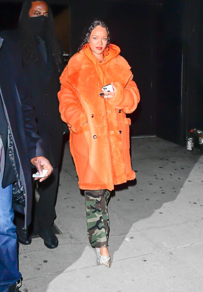 Rihanna's fans pointed out that the star was wearing big coats and baggy tops to hide her baby bump