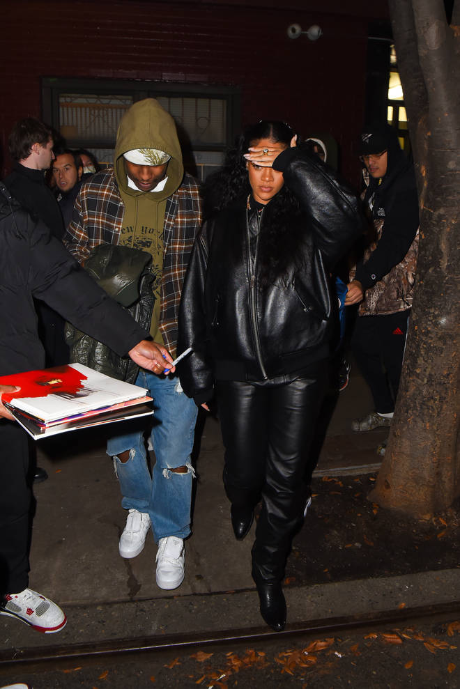 Rihanna and A$AP are pictured leaving a restaurant in Manhattan on January 19, 2022 in New York City.