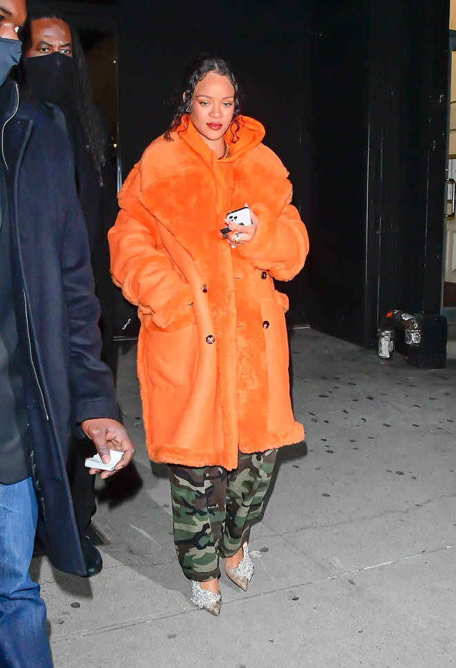 Fans suspected Rihanna was pregnant after spotting her in a baggy coat (Jan 26, 2022)