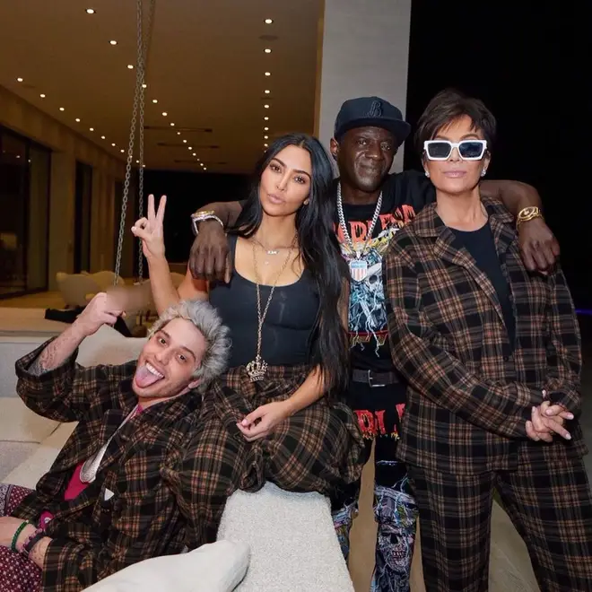 Pete (left) has been dating Kim (centre left) for around four months. Pictured here with Flavor Flav (centre right) and Kris Jenner (right.)